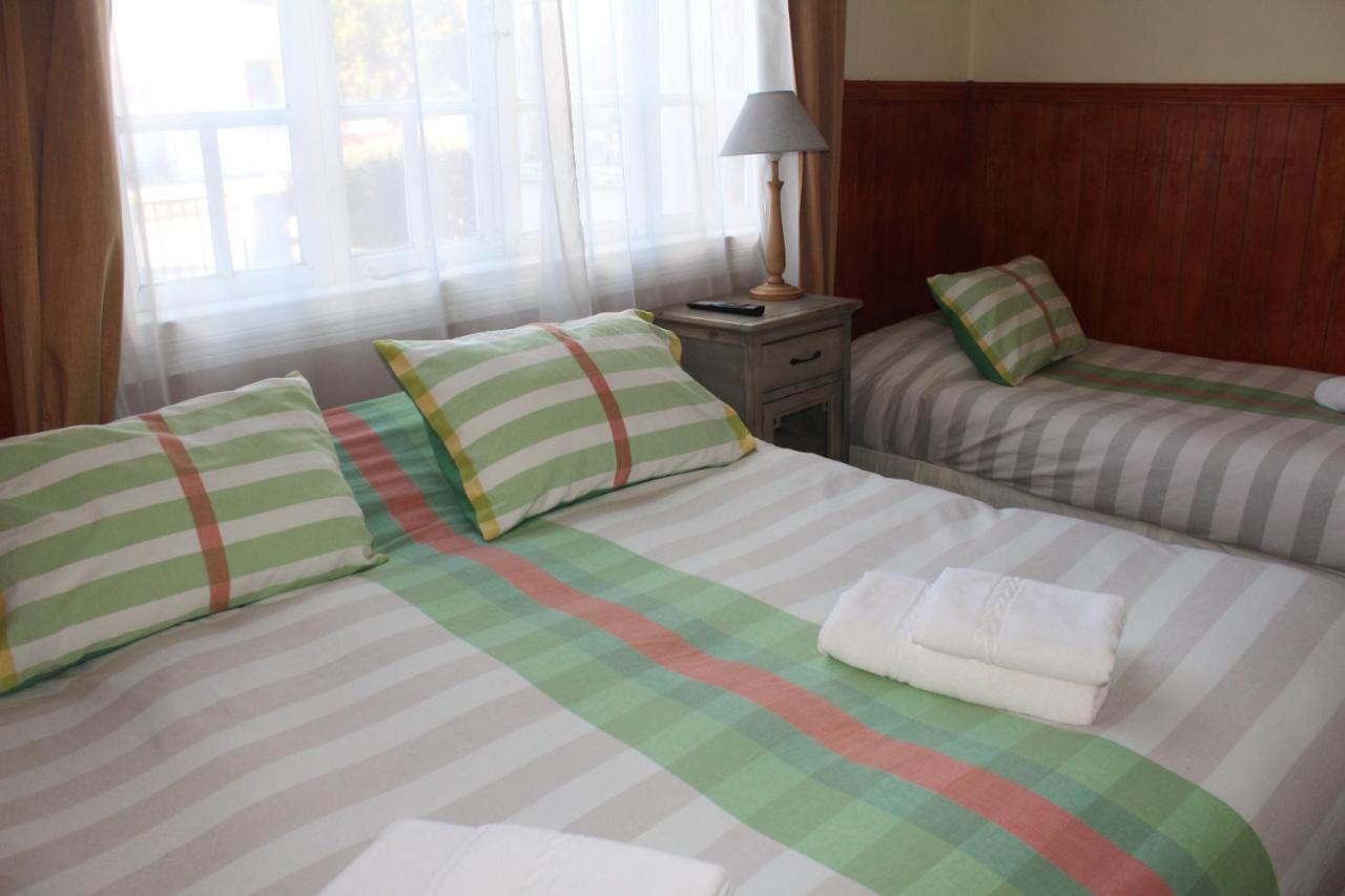 Hostal Y Cabanas Ainil Punta Arenas Bagian luar foto
