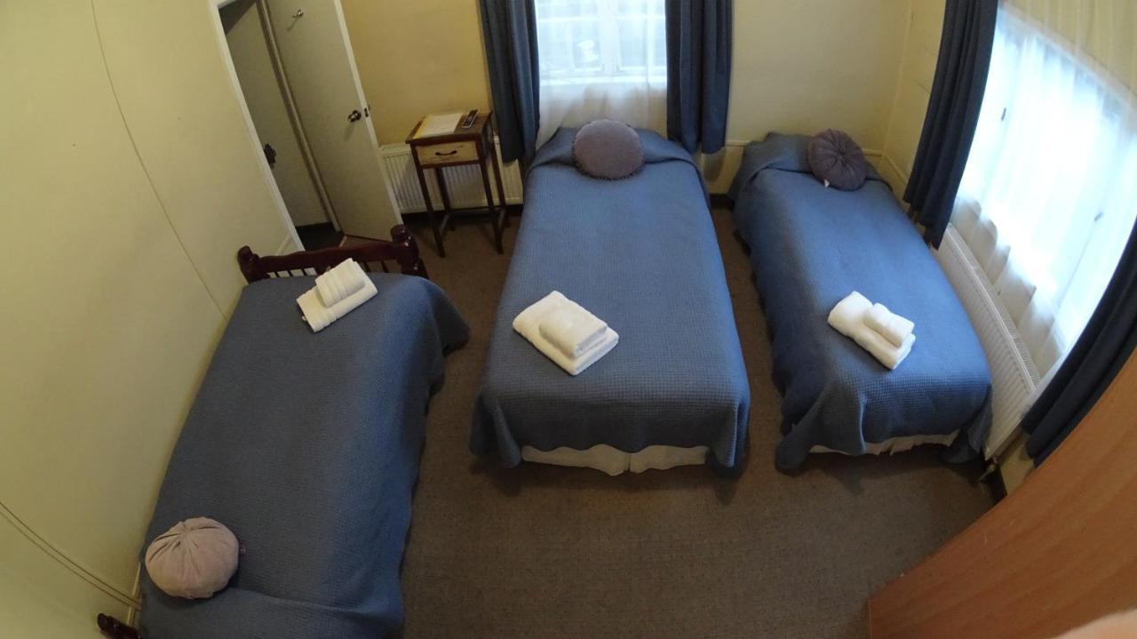 Hostal Y Cabanas Ainil Punta Arenas Bagian luar foto